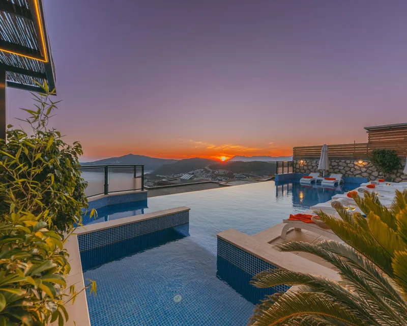 A rooftop pool at dusk