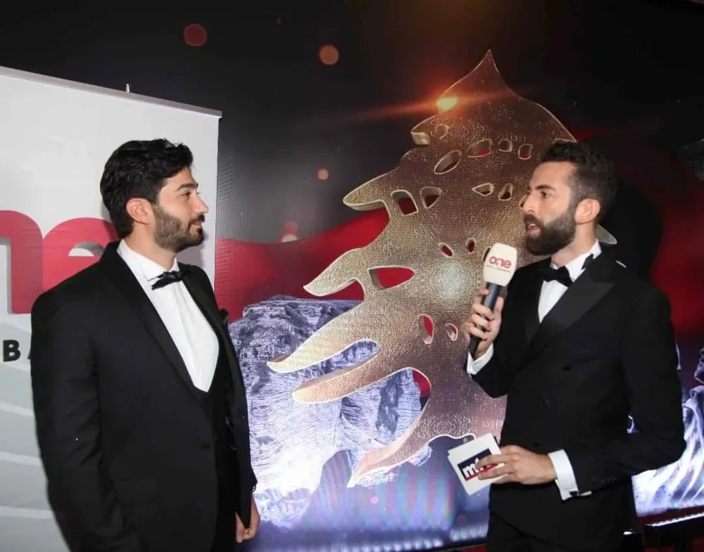 Dr. Elias Abou Tayeh interviewed by MTV Lebanon at an event