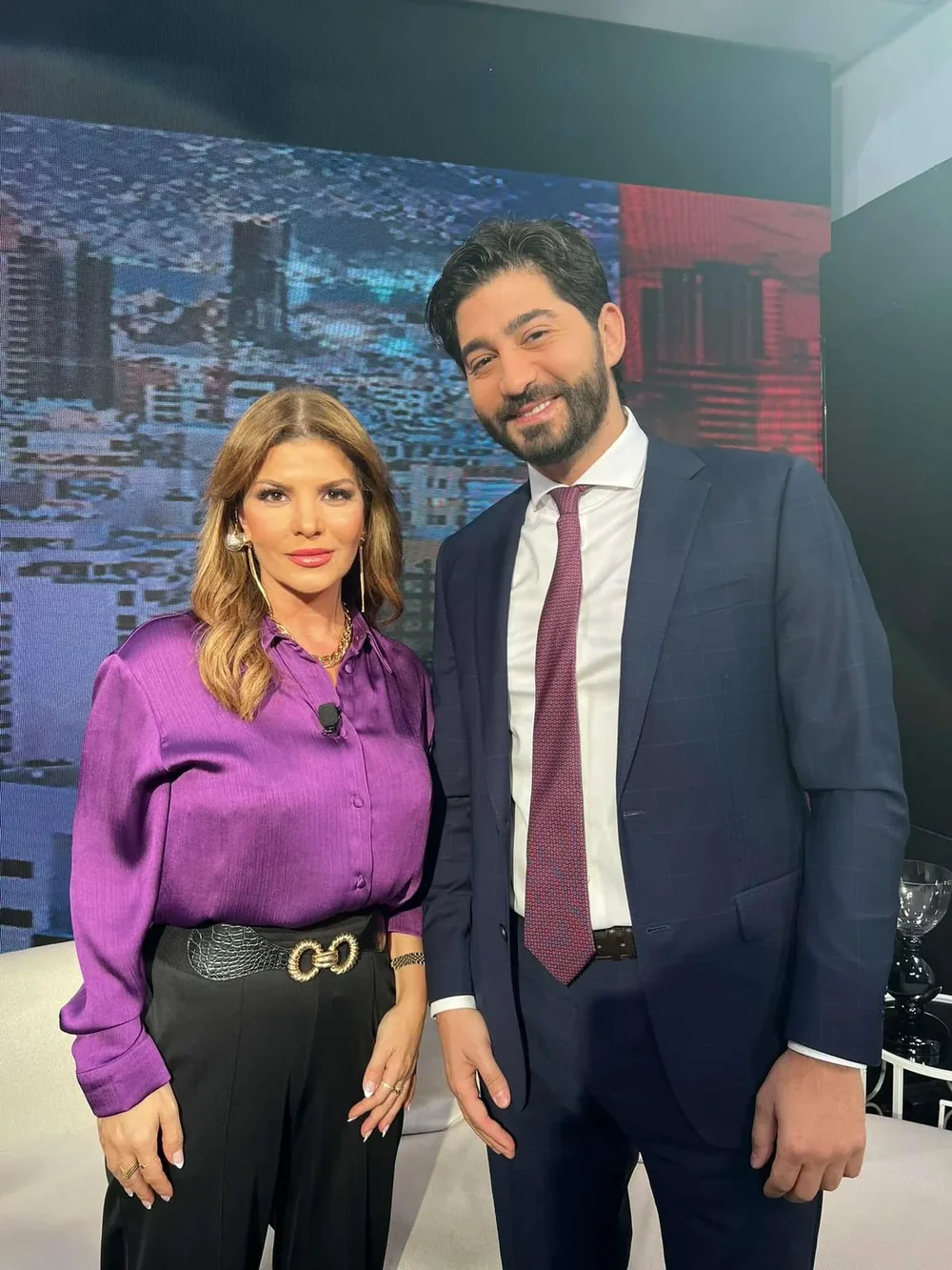 Dr. Elias Abou Tayeh with a presenter in a television studio