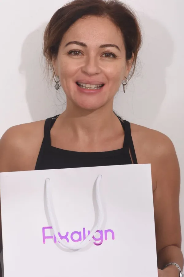 Dalia Baasiri with her Fixaligner aligners
