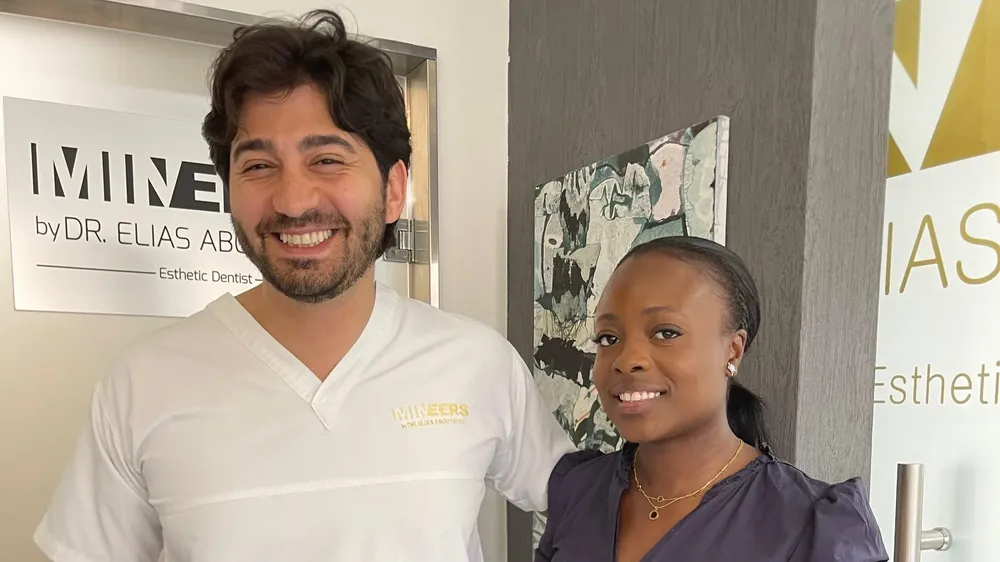 Dr. Elias Abou Tayeh with a patient at the clinic